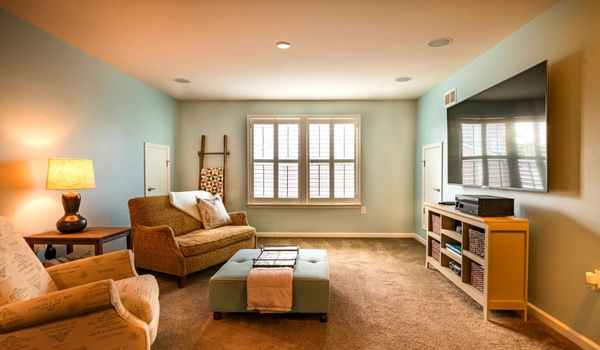 How to arrange furniture in a rectangular living room with wall mount TV